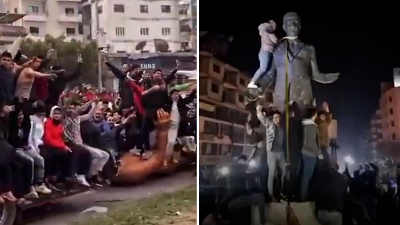 Här rivs statyn av expresidenten